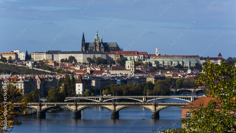 Lighten Prague during nice sunny day.  Clear blue sky over czech landmarks.