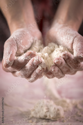 Hands with flour close baking homemade food