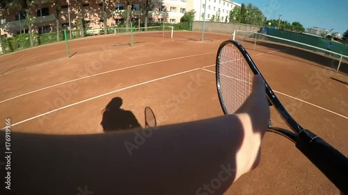 Point of view of two women compete in tennis match