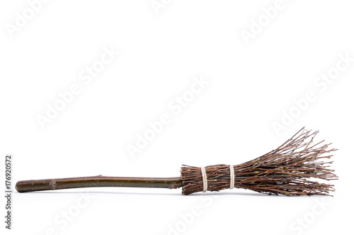Witch's magic broom isolated on white background