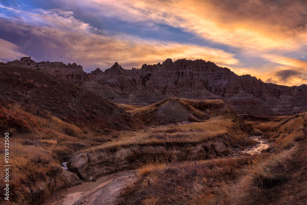 Fototapeta premium The sun sets over Badlands National Park, South Dakota