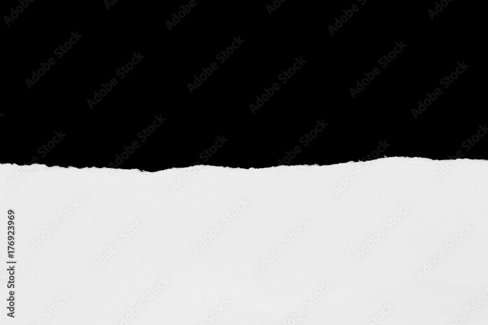 torn paper isolated on black background with copy space for text torn paper isolated on black background with copy space for text