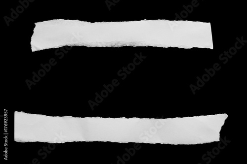 torn paper isolated on black background with copy space for text