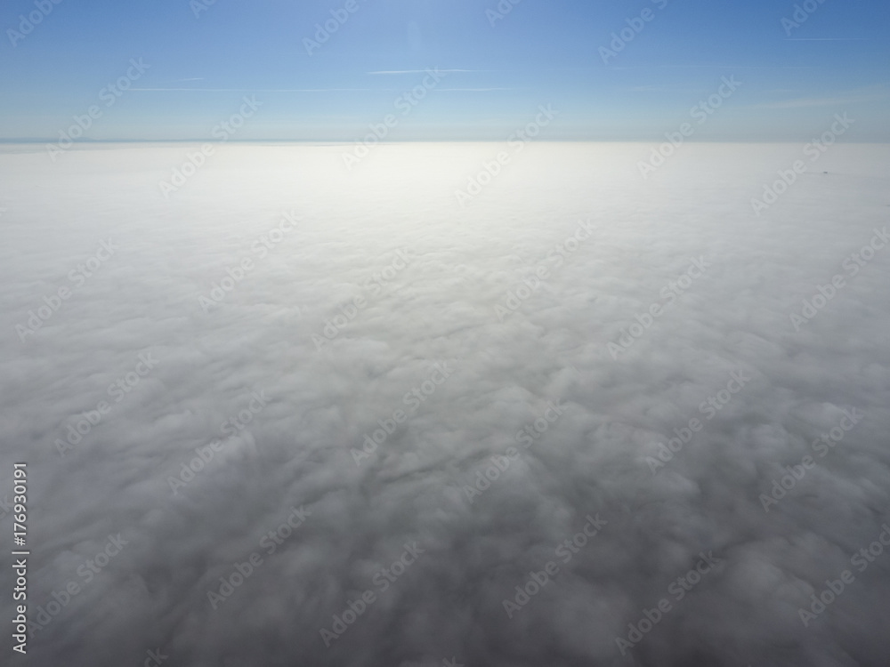 Obraz premium In the skies above the fog. Sunrise over the fog. Clouds near th