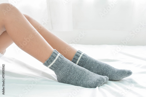 Women's socks on bed