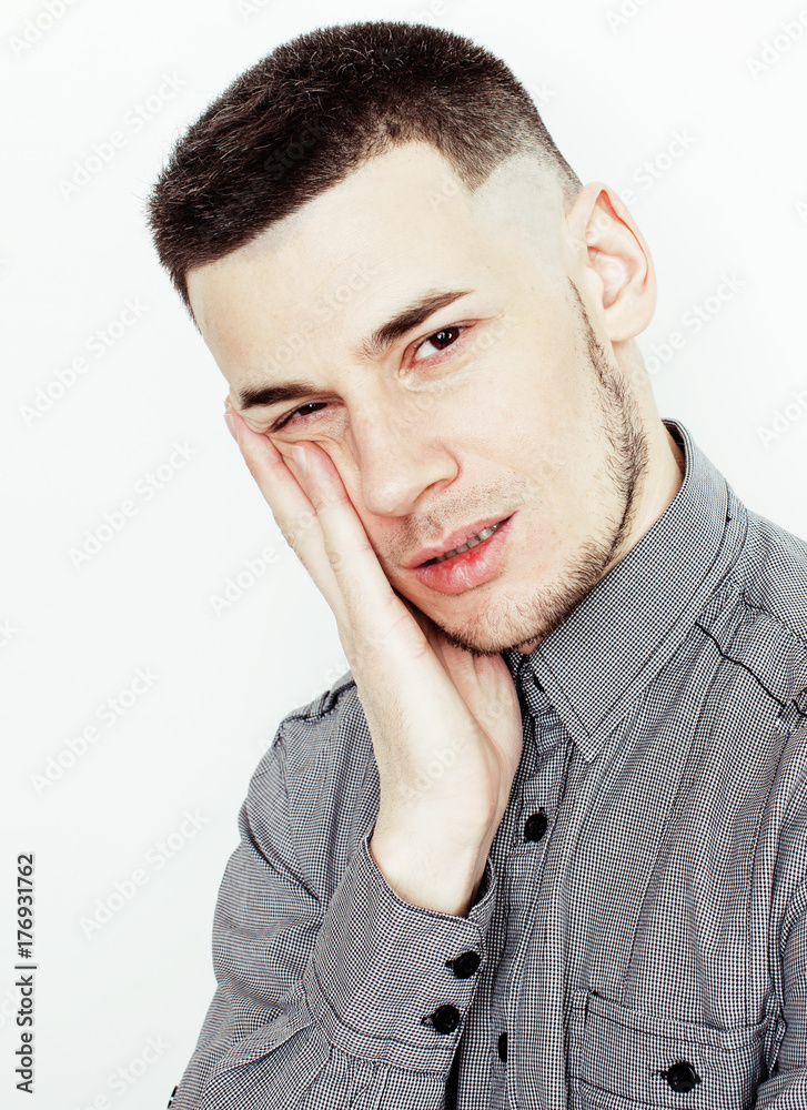 young handsome teenage hipster guy posing emotional, happy smiling against white background isolated, lifestyle people concept young handsome teenage hipster guy posing emotional, happy smiling against white background isolated, lifestyle people concept