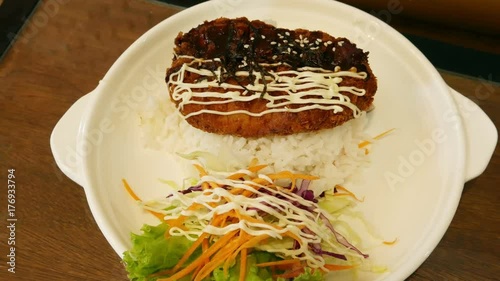 Tonkatsu - Japanese deep-fried pork cutlet with shredded cabbage photo