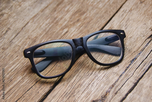 Eyeglasses Over Wooden Background