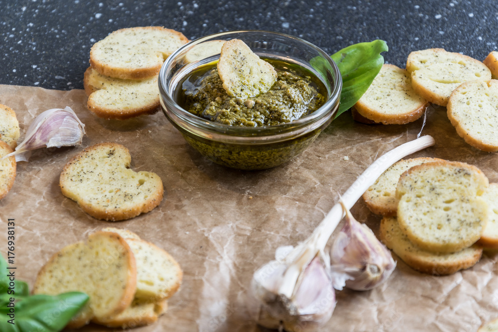 Crispy home-made basil bruschetta with basil pesto Crispy home-made basil bruschetta with basil pesto