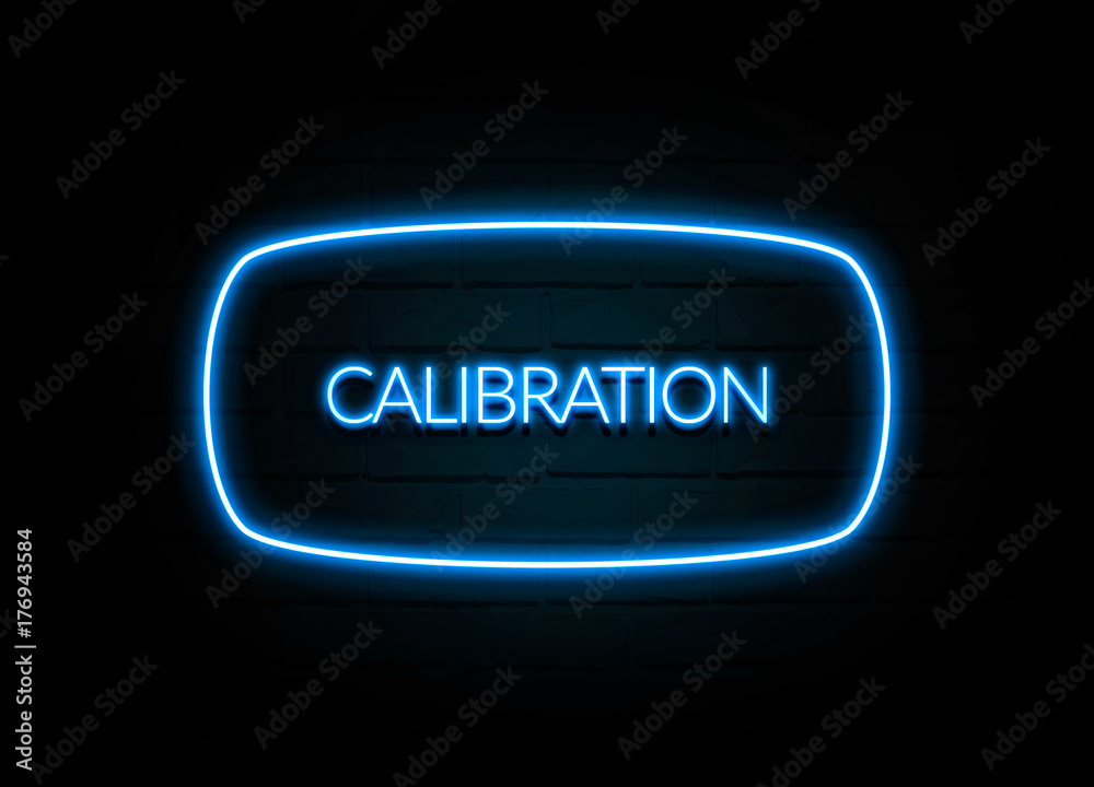 Calibration - colorful Neon Sign on brickwall Calibration - colorful Neon Sign on brickwall