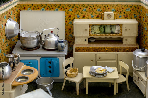Grandmother's Old Dolls Kitchen with accessories. Toys for girls from the 40s or 50s.