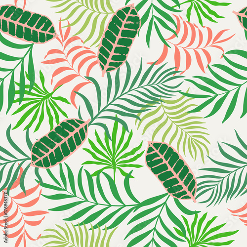 Tropical background with palm leaves. Seamless floral pattern