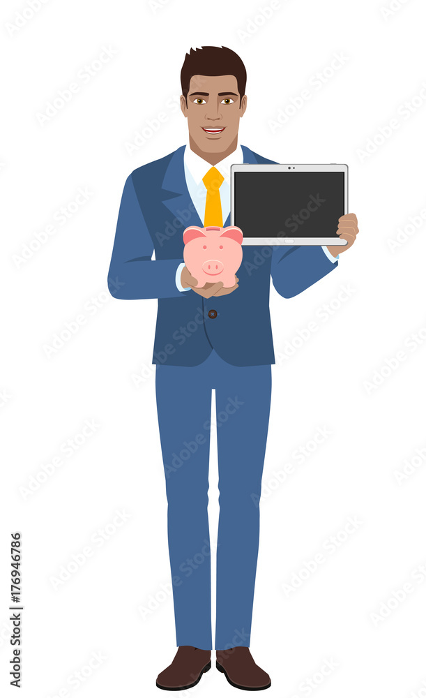 Businessman holding a piggy bank and digital tablet Businessman holding a piggy bank and digital tablet