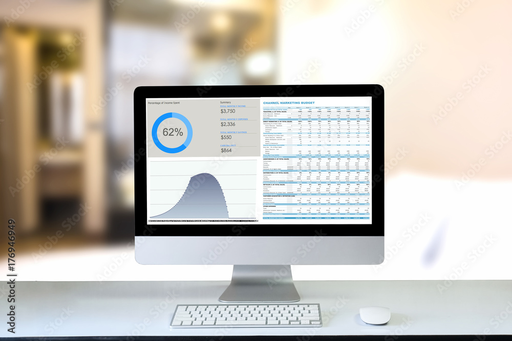 Computer desktop on office table showing charts and graph against office background,Computer Analysis Business, Statistics Concept. Computer desktop on office table showing charts and graph against office background,Computer Analysis Business, Statistics Concept.