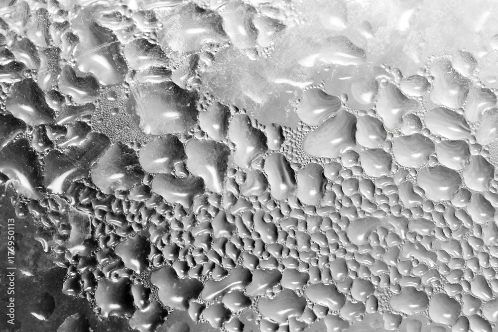 abstract background of drops on gray glass