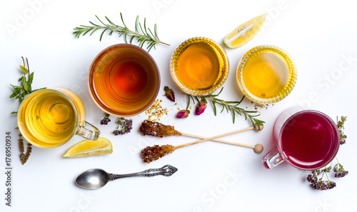 Herbal tea collection glasses on white background