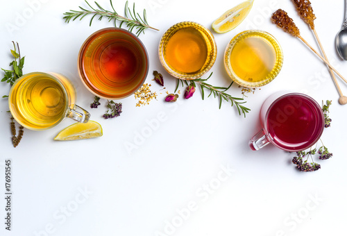 Herbal tea collection glasses on white background