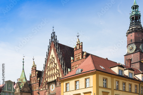 Beautiful old building on Wroclaw Old Town against blue summer sky, Poland, Lower Silesia