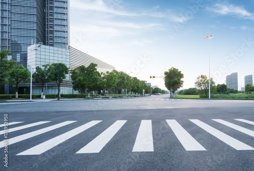 Obraz na płótnie empty road with modern buildings on background,shanghai,china. w salonie
