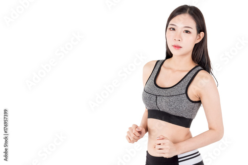 Young fitness woman isolated on white background