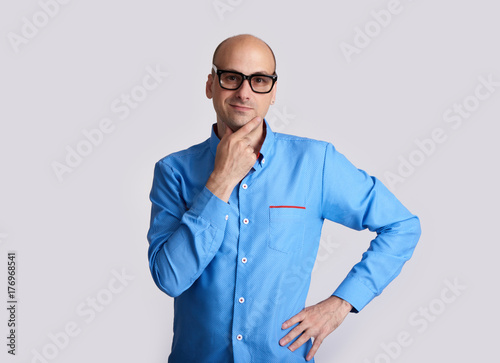 handsome positive man wearing glasses. Isolated