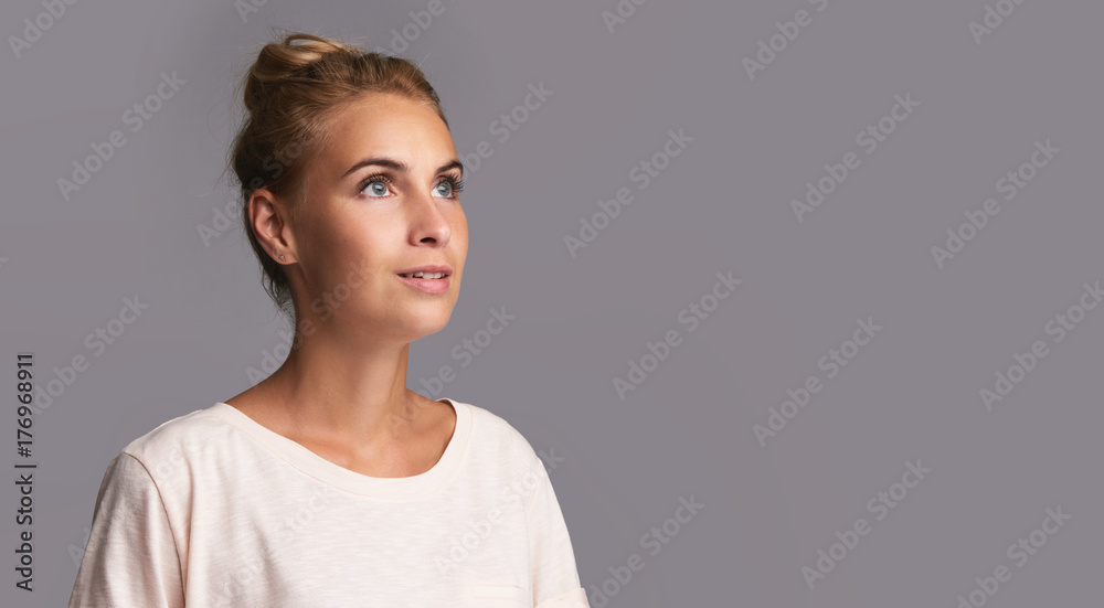 pretty young woman looking up. Isolated pretty young woman looking up. Isolated