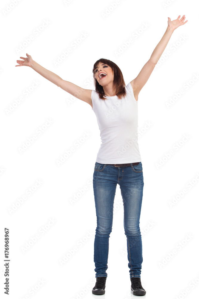 Happy Young Woman Is Standing With Arms Outstretched And Shouting Happy Young Woman Is Standing With Arms Outstretched And Shouting