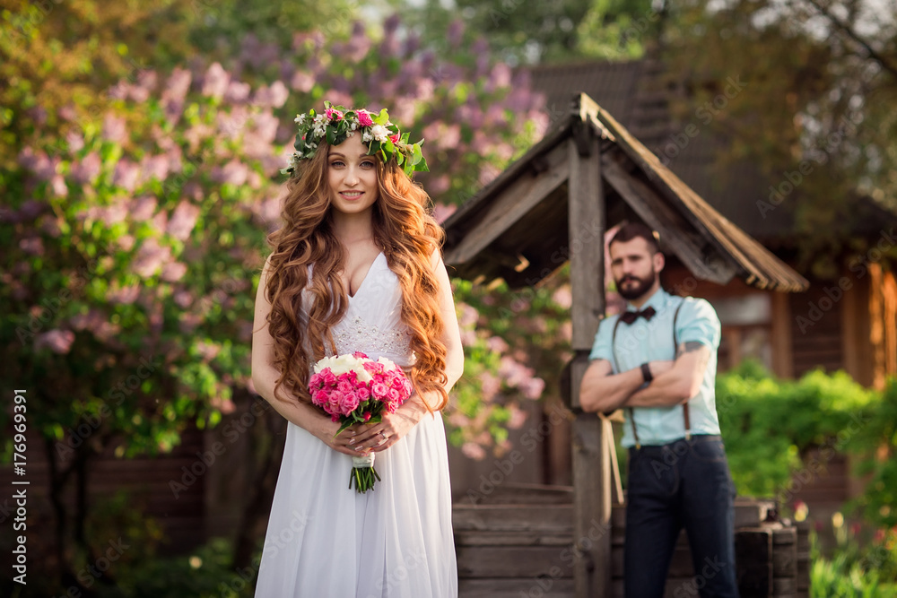 Naklejka premium The groom and the bride in the country.