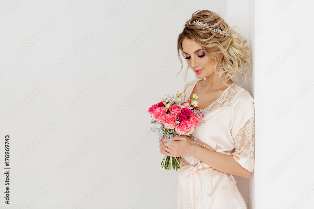 Portrait of beautiful bride. Blonde girl with curly hair and fashion makeup.