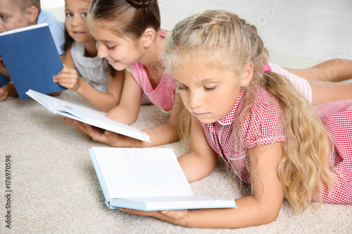 Cute little children readin...