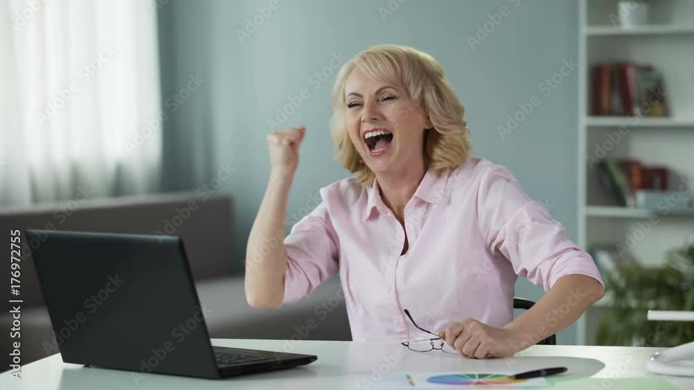 Female pensioner happy to win in creative idea competition, successful lady Female pensioner happy to win in creative idea competition, successful lady