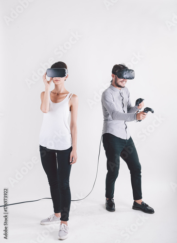 boy and girl in virtual reality headset on white background