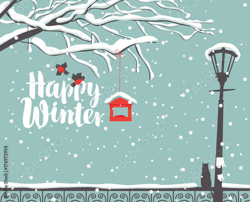 Vector winter scene at the snow-covered park with calligraphic inscription Happy Winter, with branches of a tree, bullfinches and a bird feeder, a street lamp and a cat on the fence in the snow
