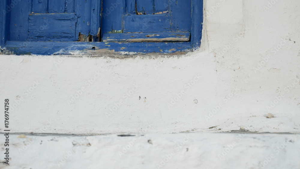 Europe's Secret Islands/ Old blue door and a white wall.
