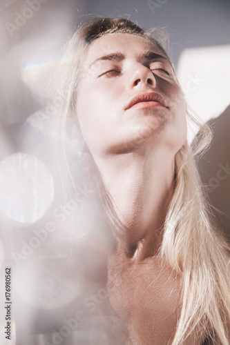 girl appears from sunbeams