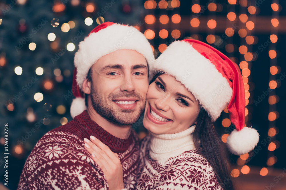 True love and feelings! Close up of adorable, lovely, sensual cute partners cuddling, brunette lady is with beaming smile, so cheerful, winter feast, blurred illumination on background True love and feelings! Close up of adorable, lovely, sensual cute partners cuddling, brunette lady is with beaming smile, so cheerful, winter feast, blurred illumination on background