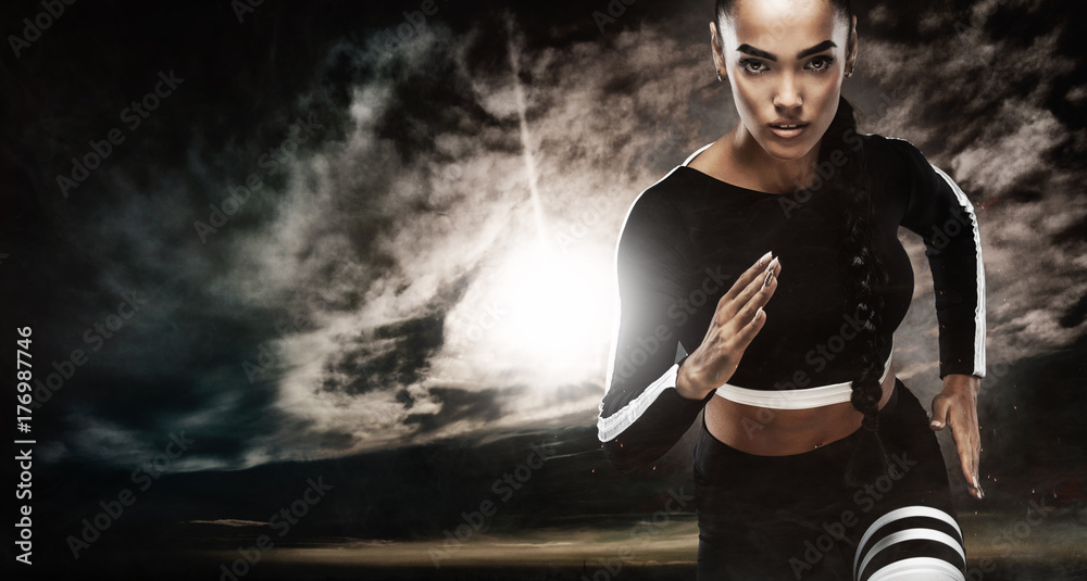 A strong athletic, female sprinter, running at sunrise wearing in the  sportswear, fitness and sport motivation concept with copy space. Stock  Photo by ©MikeOrlov 171278364