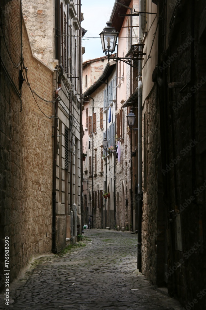 Dark street in Recanati downtown, Marche, italy