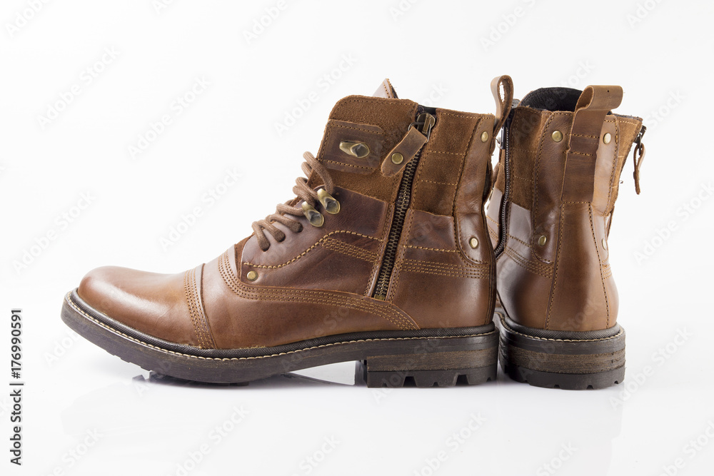 Male brown leather shoe on white background, isolated product, comfortable footwear. Male brown leather shoe on white background, isolated product, comfortable footwear.