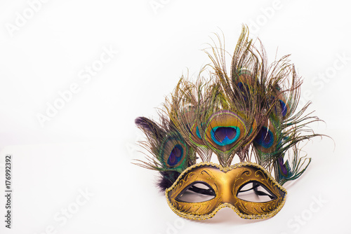 Venetian carnival mask with peacock feathers photo