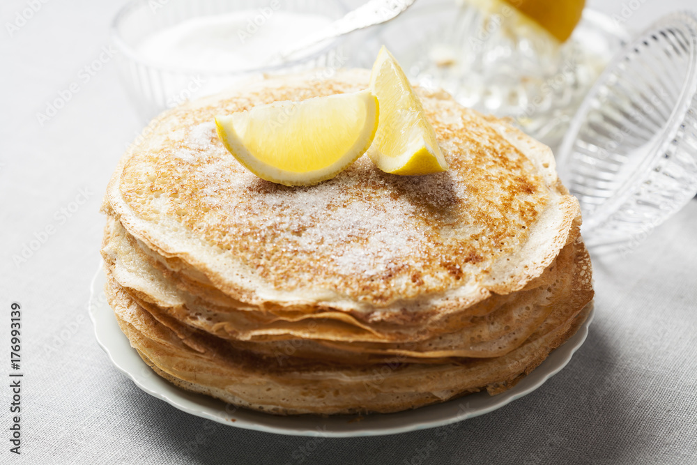 English-style pancakes with lemon and sugar, traditional for Shrove Tuesday. English-style pancakes with lemon and sugar, traditional for Shrove Tuesday.