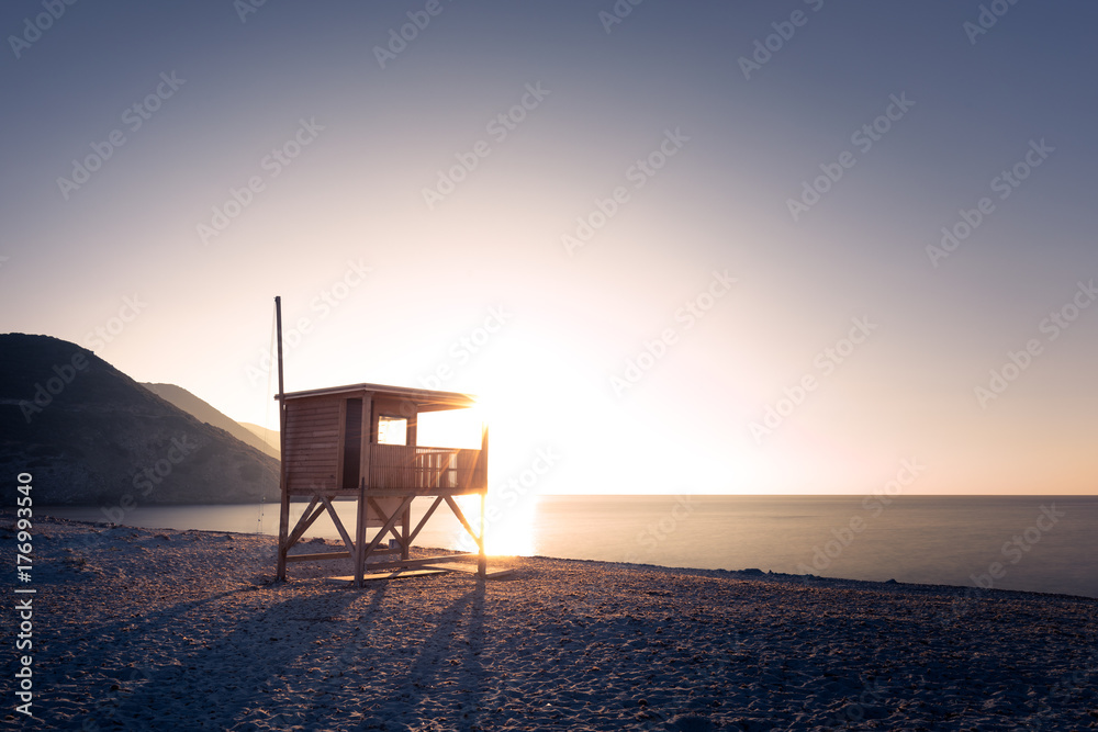 Evening sun on lifeguard tower on Ostriconi beach in Corsica