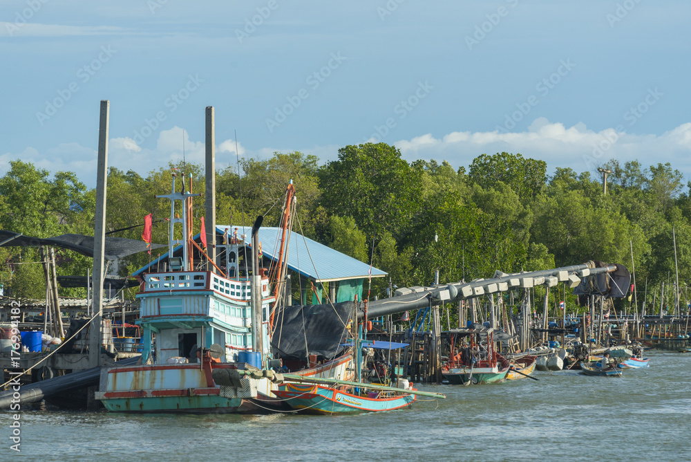Samutsakhon, Thailand-October 11, 2017: Coastal fishing boats in the seaside area of Thailand. in Samutsakhon, Thailand Samutsakhon, Thailand-October 11, 2017: Coastal fishing boats in the seaside area of Thailand. in Samutsakhon, Thailand