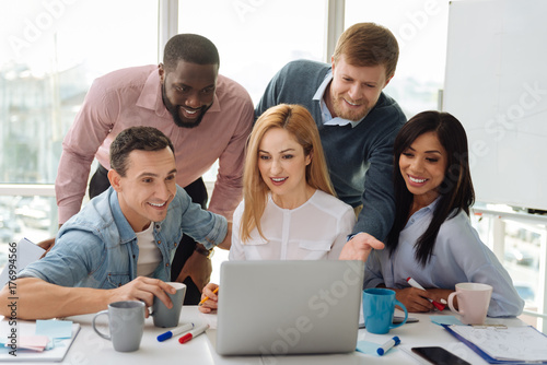 Group of smiling people that actively discussing