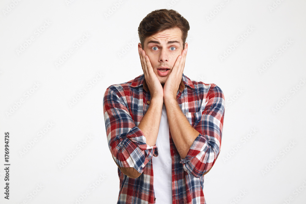 Portrait of a shocked casual man Portrait of a shocked casual man