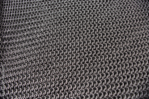 Metal chainmail ring pattern background