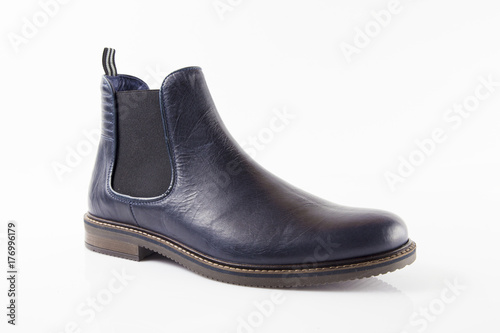 Male blue leather shoe on white background, isolated product, comfortable footwear.