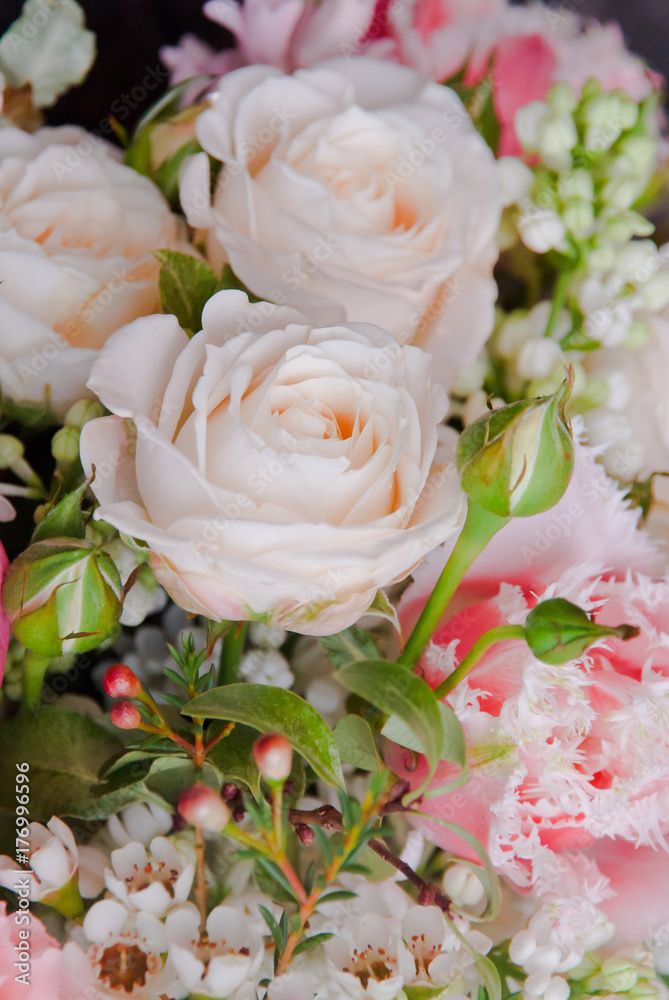 Obraz premium Beautiful pink white wedding bouquet with rose flowers closeup background