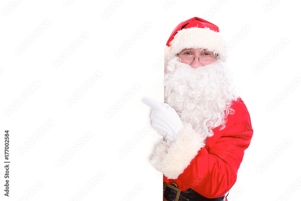 Kind Santa Claus pointing in white blank sign, isolated on white background Kind Santa Claus pointing in white blank sign, isolated on white background