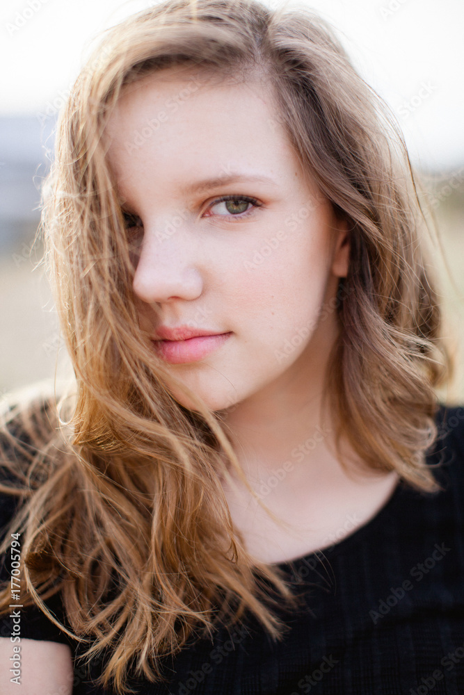 Portrait of a teen girl in black top Portrait of a teen girl in black top